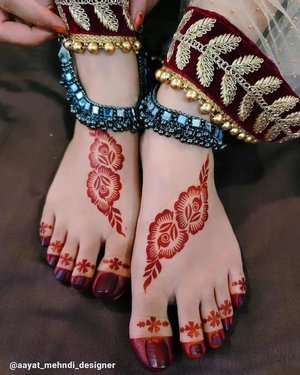 Mandala Feather Stroke mehndi design for back hand — exquisite henna pattern