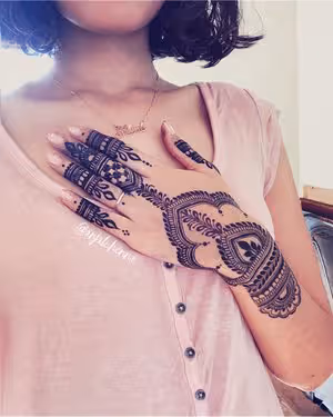 Mandala Dotwork mehndi design for full hand — delicate henna pattern