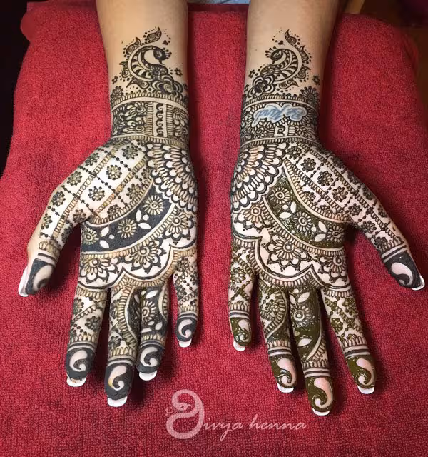 Back Hand Heart Vine mehndi design for front hand — striking henna pattern