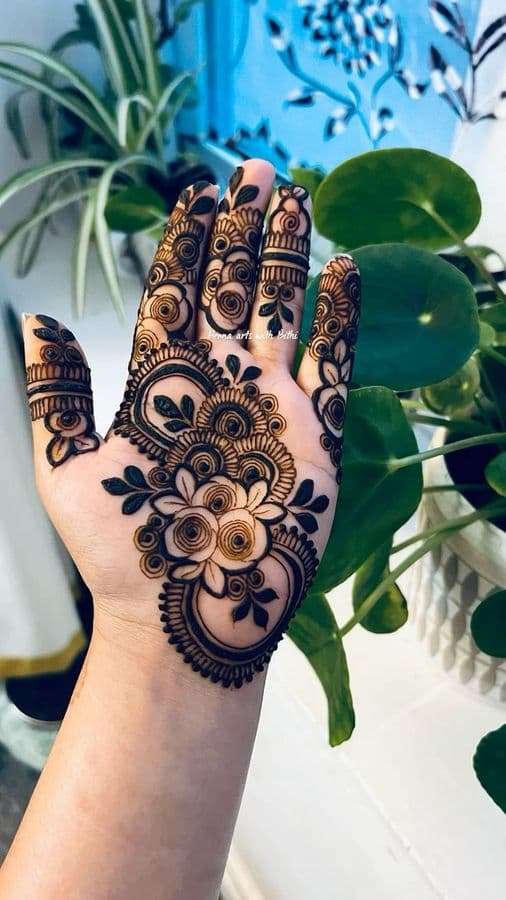 Indian Spiral Rosette mehndi design for back hand — dainty henna pattern
