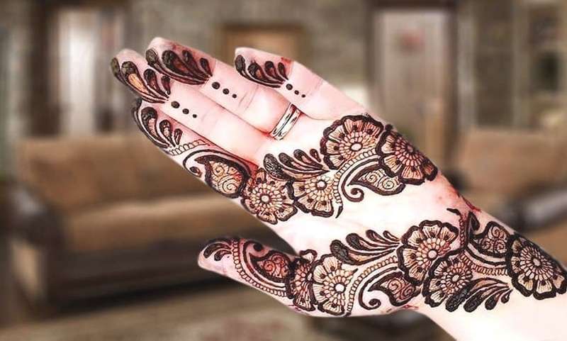 Rajasthani Lotus Pattern mehndi design for back hand — sophisticated henna pattern
