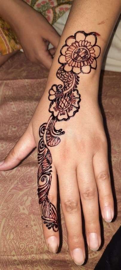 African Floral Vine mehndi design for back hand — contemporary henna pattern