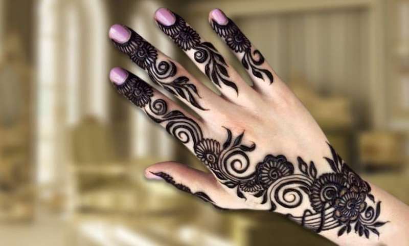 Indian Ribbon Weave mehndi design for back hand — mesmerizing henna pattern